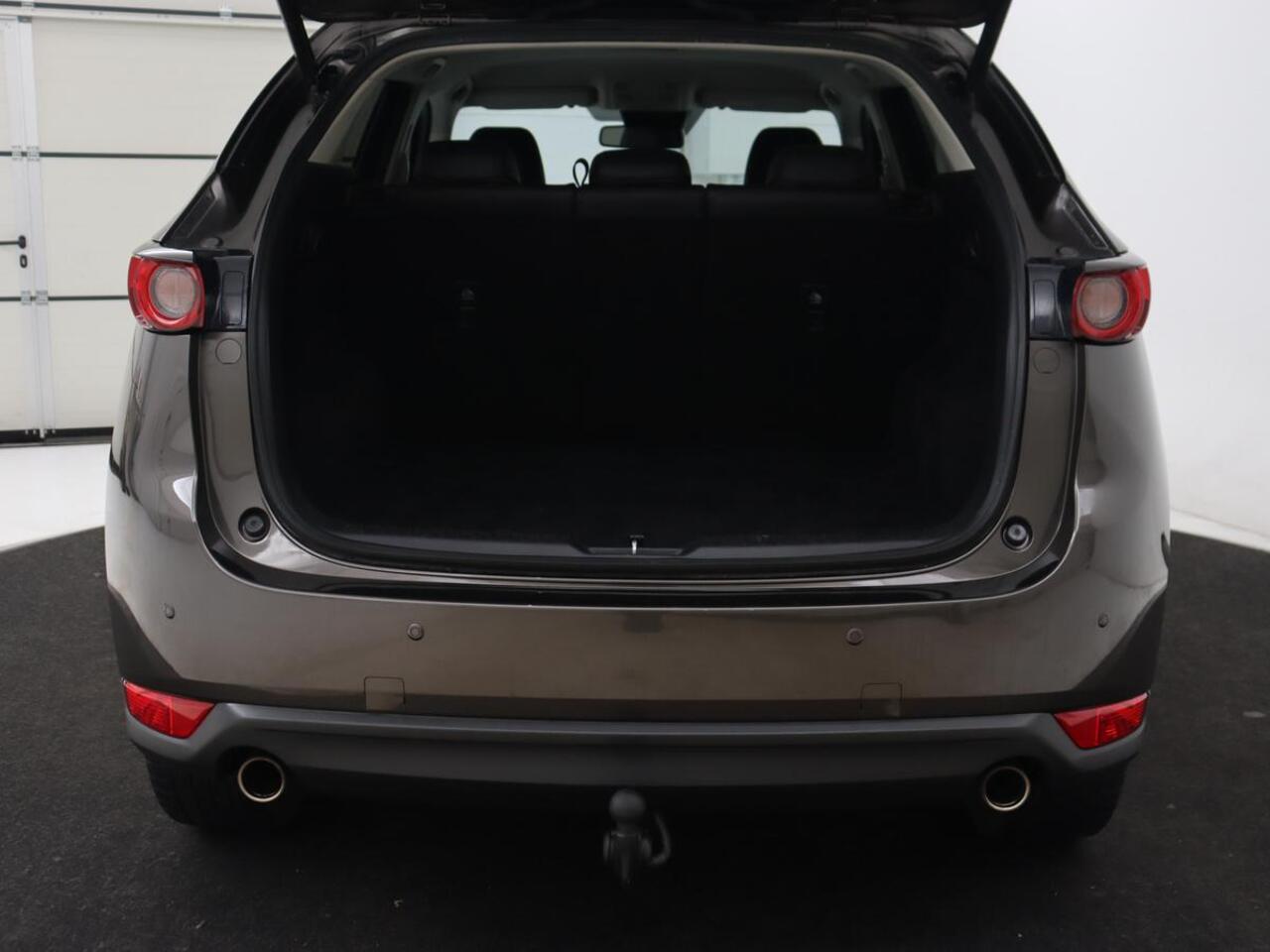 Mazda CX-5 2.0 SkyActiv-G 165 Sportive | Leder/Alcantara | Trekhaak | Head-Up | Adaptive cruise | 360 Camera | Stoel & stuurverwarming | Navigatie | Full LED | Keyless | Carplay | 19'' lichtmetalen velgen