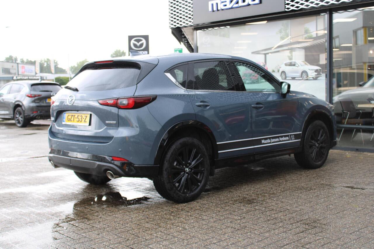 Mazda CX-5 2.0 e-SkyActiv-G M Hybrid 165 Homura & Comfort Pack, Demovoordeel ¤ 7.390-, Navi, Adap.Cruise, Clima, Leder, Apple Carplay, 360 Camera, PDC, HUD, Stoelverwarming/ventilatie, 19" LMV, Elek.Achterklep