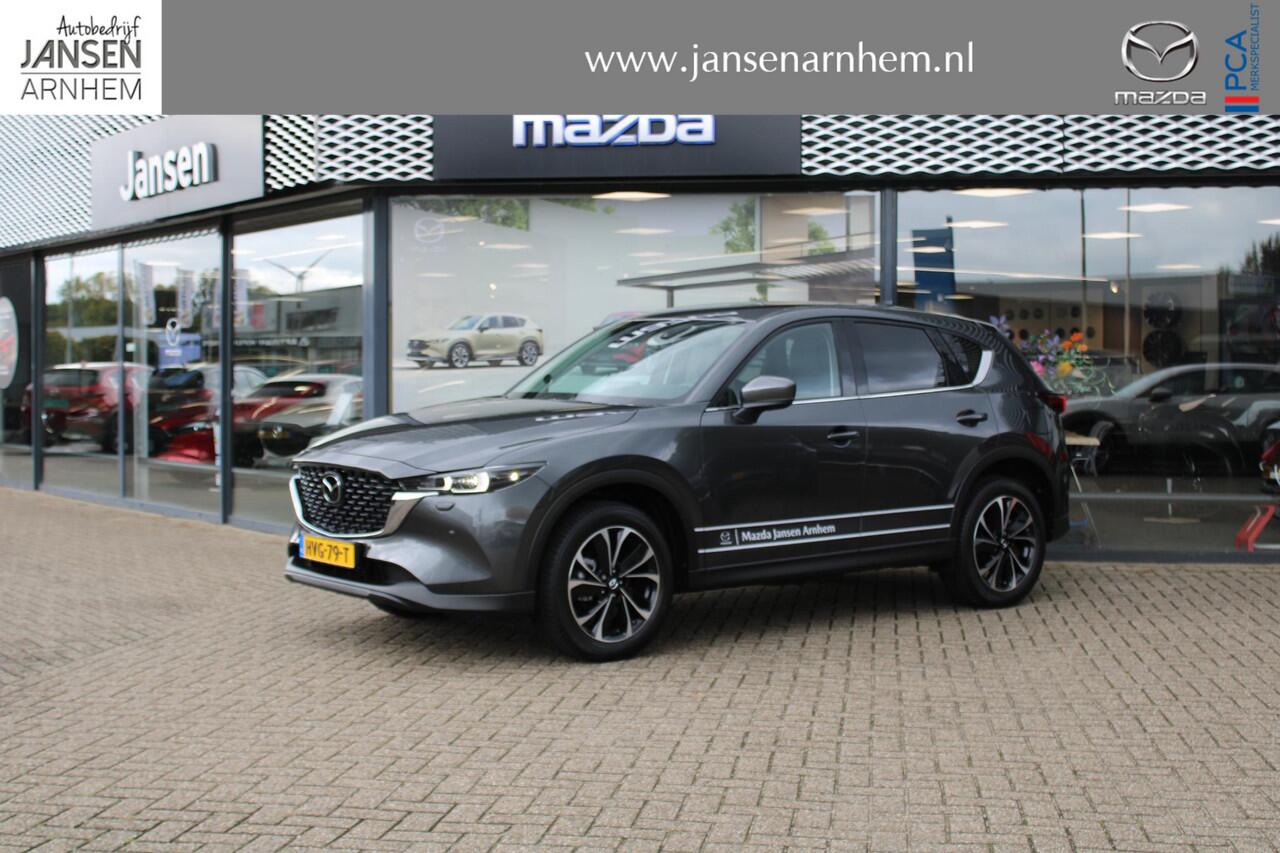 Mazda CX-5 2.0 e-SkyActiv-G M Hybrid 165 Exclusive-Line , Demovoordeel ¤ 9.100,-, Black Comfort Pack, Navi, Adap.Cruise, Clima, Leder, Apple Carplay, 360 Camera, PDC, HUD, Stoelverwarming/ventilatie, 19" LMV