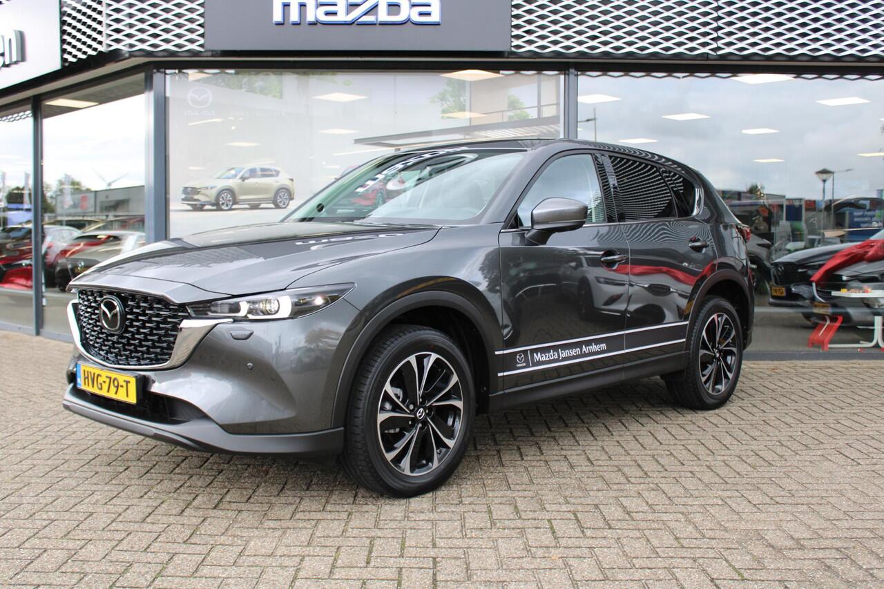 Mazda CX-5 2.0 e-SkyActiv-G M Hybrid 165 Exclusive-Line , Demovoordeel ¤ 9.100,-, Black Comfort Pack, Navi, Adap.Cruise, Clima, Leder, Apple Carplay, 360 Camera, PDC, HUD, Stoelverwarming/ventilatie, 19" LMV