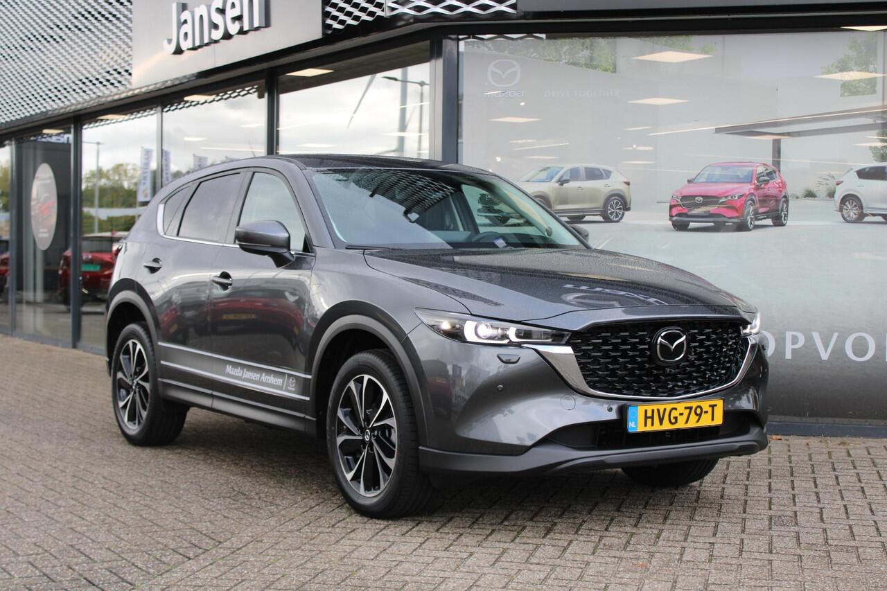 Mazda CX-5 2.0 e-SkyActiv-G M Hybrid 165 Exclusive-Line , Demovoordeel ¤ 9.100,-, Black Comfort Pack, Navi, Adap.Cruise, Clima, Leder, Apple Carplay, 360 Camera, PDC, HUD, Stoelverwarming/ventilatie, 19" LMV