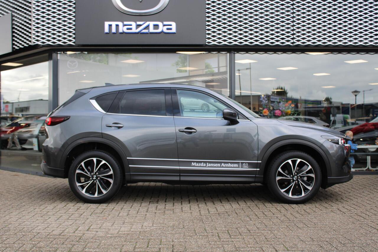 Mazda CX-5 2.0 e-SkyActiv-G M Hybrid 165 Exclusive-Line , Demovoordeel ¤ 9.100,-, Black Comfort Pack, Navi, Adap.Cruise, Clima, Leder, Apple Carplay, 360 Camera, PDC, HUD, Stoelverwarming/ventilatie, 19" LMV