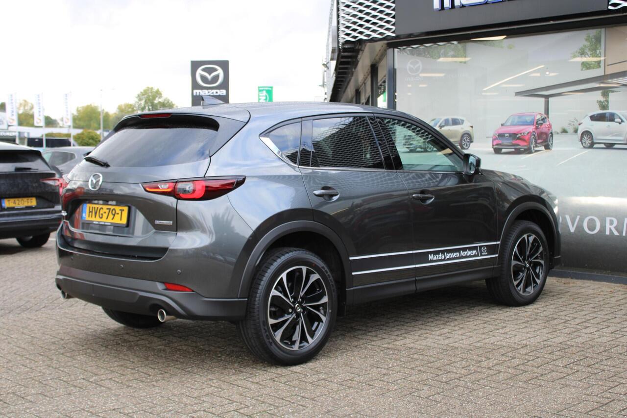 Mazda CX-5 2.0 e-SkyActiv-G M Hybrid 165 Exclusive-Line , Demovoordeel ¤ 9.100,-, Black Comfort Pack, Navi, Adap.Cruise, Clima, Leder, Apple Carplay, 360 Camera, PDC, HUD, Stoelverwarming/ventilatie, 19" LMV