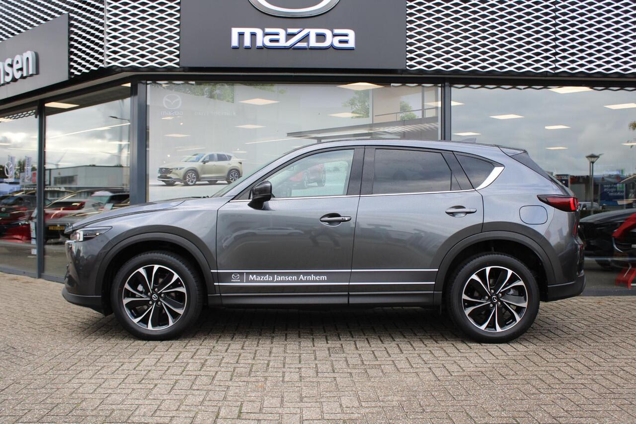 Mazda CX-5 2.0 e-SkyActiv-G M Hybrid 165 Exclusive-Line , Demovoordeel ¤ 9.100,-, Black Comfort Pack, Navi, Adap.Cruise, Clima, Leder, Apple Carplay, 360 Camera, PDC, HUD, Stoelverwarming/ventilatie, 19" LMV