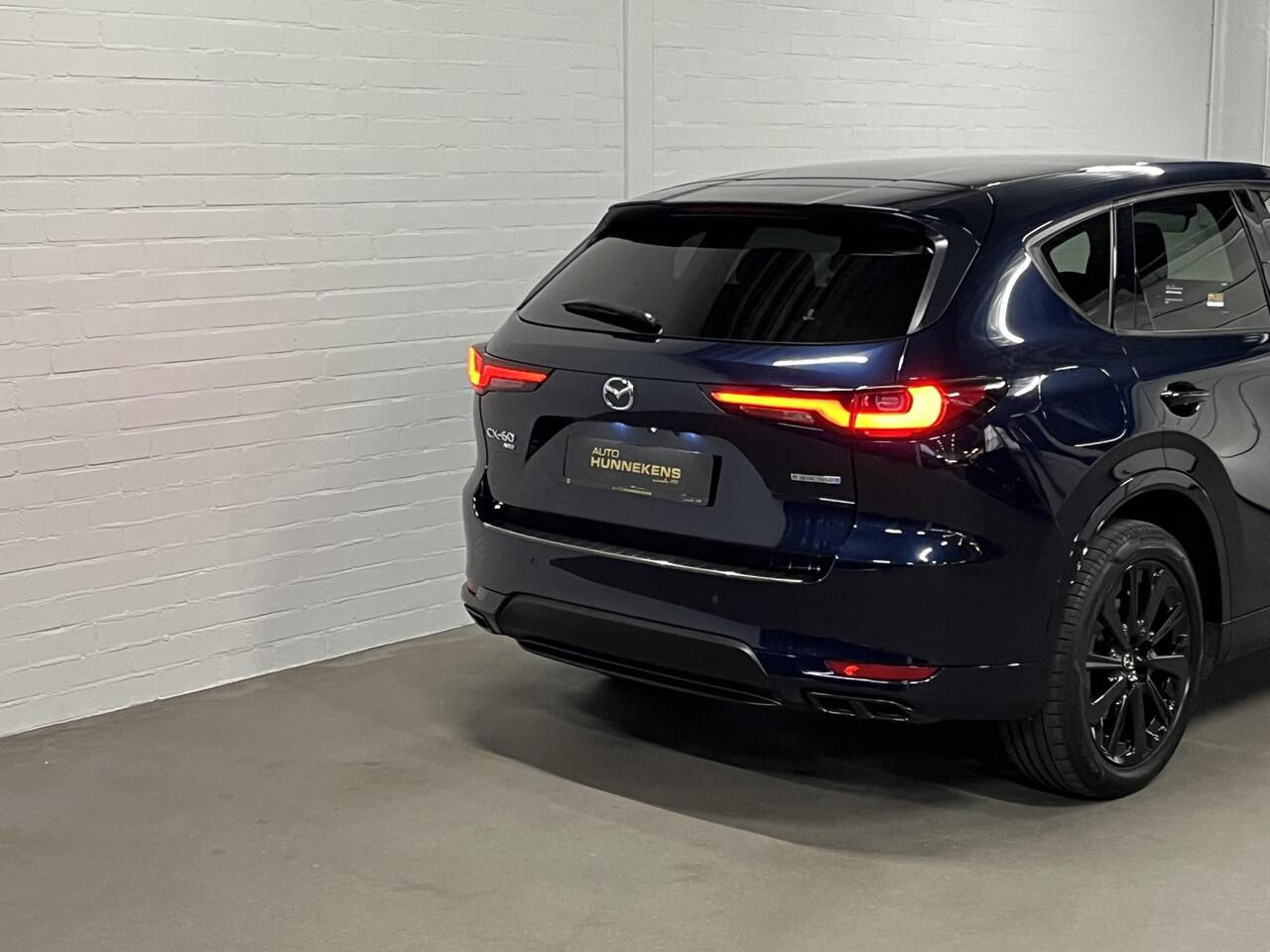 Mazda CX-60 2.5 e-SkyActiv PHEV Homura Trekhaak | Open dak | Adapt. cruise | 360 camera | Stoelventilatie | Stoel-/stuurverwarming | Head-up