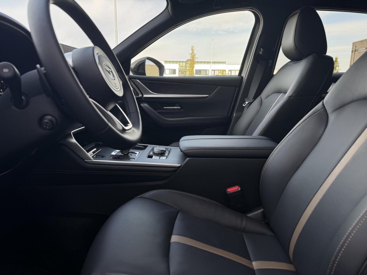 Mazda CX-60 2.5 e-SkyActiv PHEV Homura Business Edition | Stoelverwarming/verkoeling | Adaptive cruisecontrol | Lederen bekleding | Elektrische stoelen met geheugenfunctie | Stuurwiel elektrisch verstelbaar |360* camera | Elektronische achterklep |