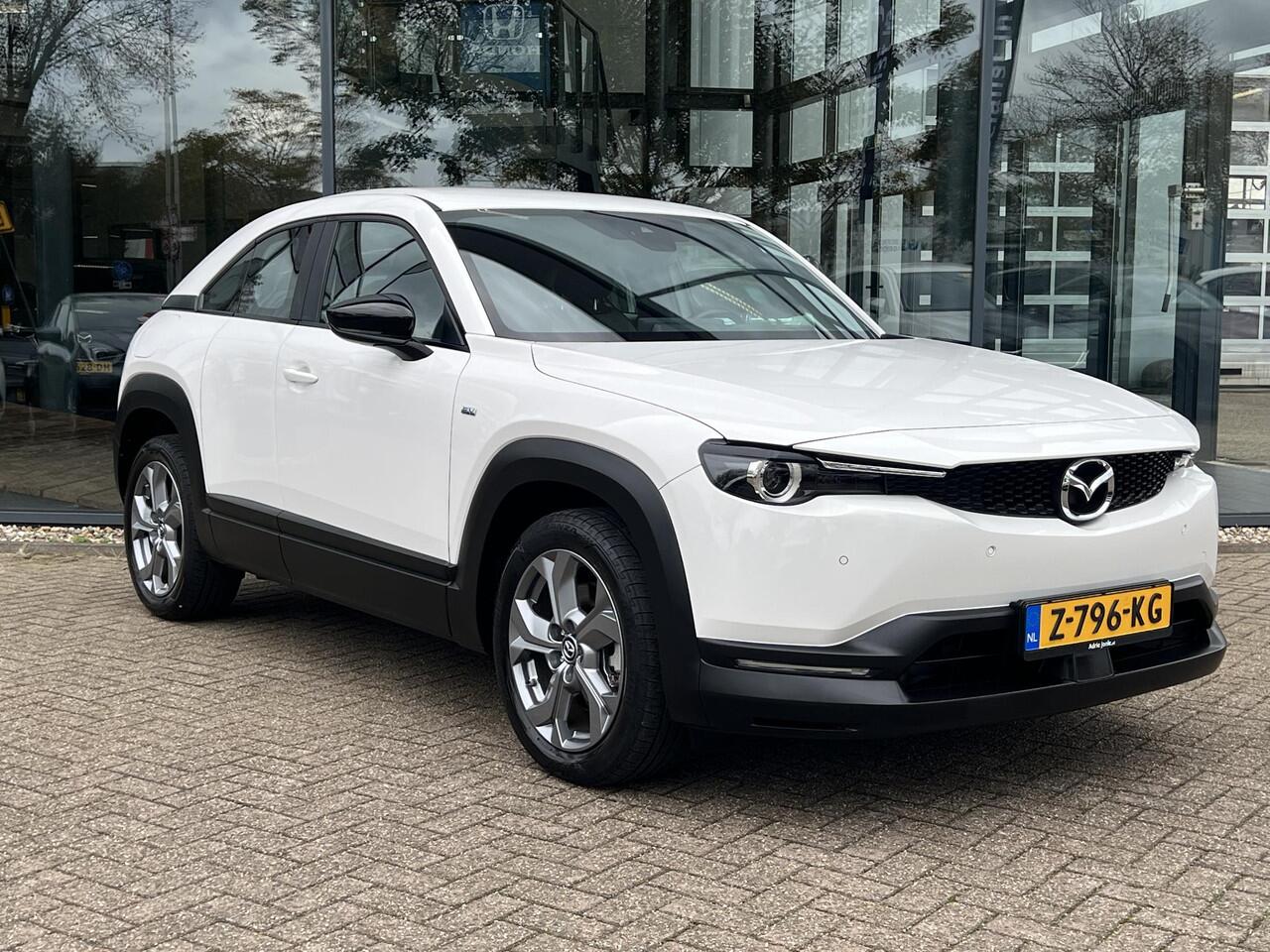 Mazda MX-30 e-SkyActiv EV 145 Prime-line 36 kWh AUTOMAAT | PARKEERSENSOREN V+A | DODEHOEKDETECTIE | ACHTERUITRIJCAMERA | ADAPT. CRUISE CONTROL | KEYLESS | CLIMATE CONTROL | CARPLAY |