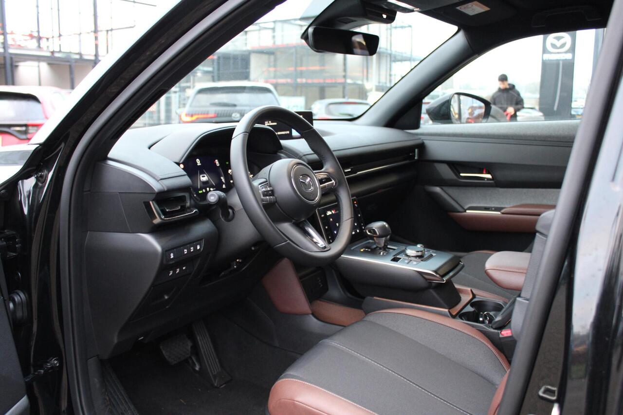 Mazda MX-30 e-SkyActiv R-EV 170 Advantage , Demovoordeel ¤ 13.190-, Adap.Cruise, Navi, Apple Carplay, Clima, Camera, PDC, HUD, Stoelverwarming, 18" LMV