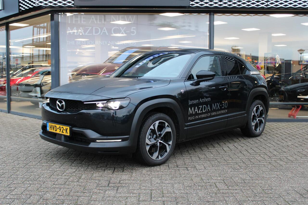 Mazda MX-30 e-SkyActiv R-EV 170 Advantage , Demovoordeel ¤ 13.190-, Adap.Cruise, Navi, Apple Carplay, Clima, Camera, PDC, HUD, Stoelverwarming, 18" LMV