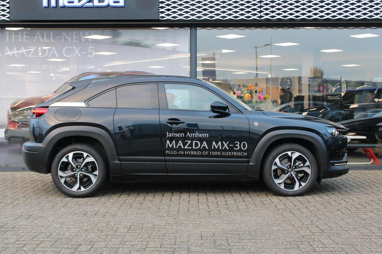 Mazda MX-30 e-SkyActiv R-EV 170 Advantage , Demovoordeel ¤ 13.190-, Adap.Cruise, Navi, Apple Carplay, Clima, Camera, PDC, HUD, Stoelverwarming, 18" LMV