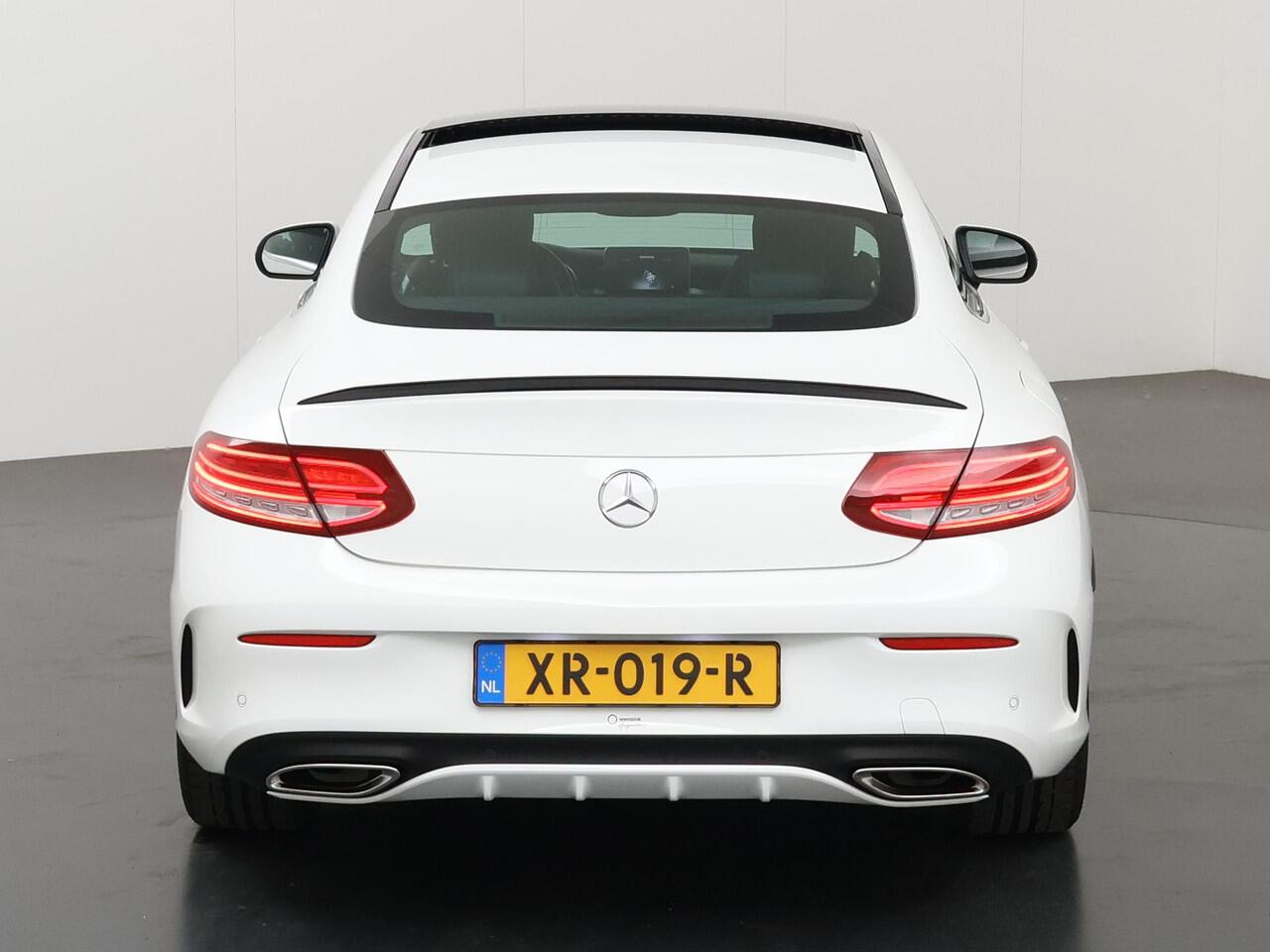 Mercedes-Benz C-KLASSE Coupé 180 Premium Plus | AMG | Panoramadak | Memory | Sfeerverlichting | Stoelverwarming |