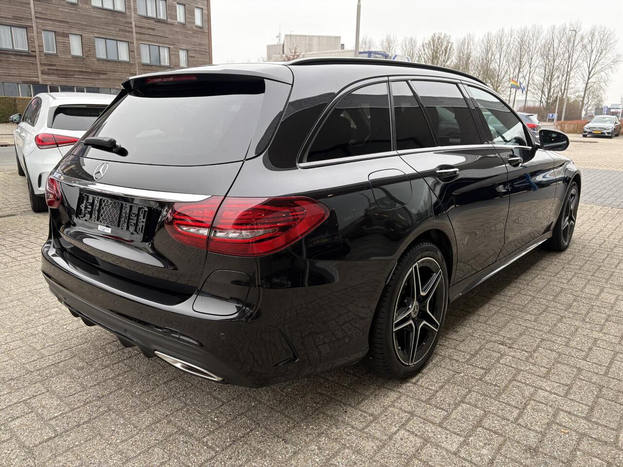 Mercedes-Benz C-KLASSE Estate 300e T AMG Line | Plug-in Hybride | PHEV | Panoramadak | Stoelverwarming | Achteruitrijcamera | Eektrisch vestelbare stoelen | Dealer onderhouden