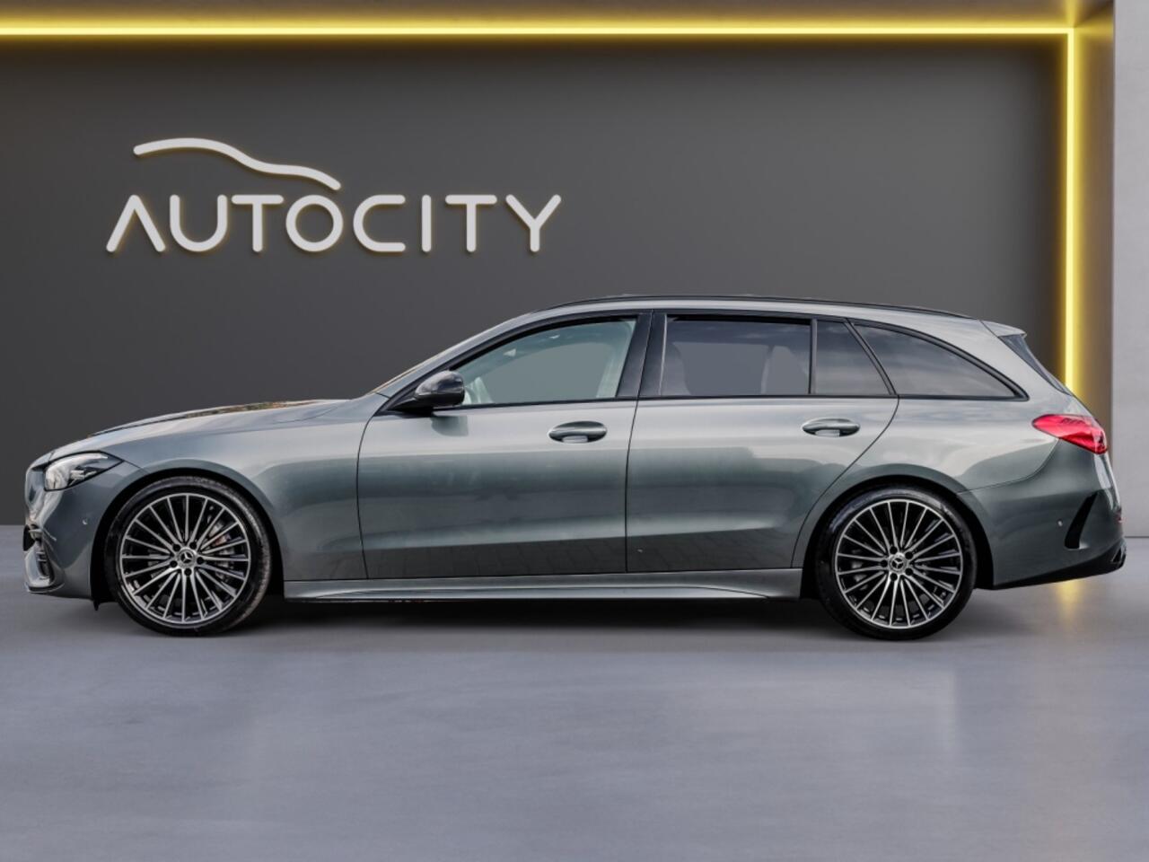 Mercedes-Benz C-KLASSE Estate 200 Edition AMG Line Panorama l Trekhaak l Bi Color Leder l Burm