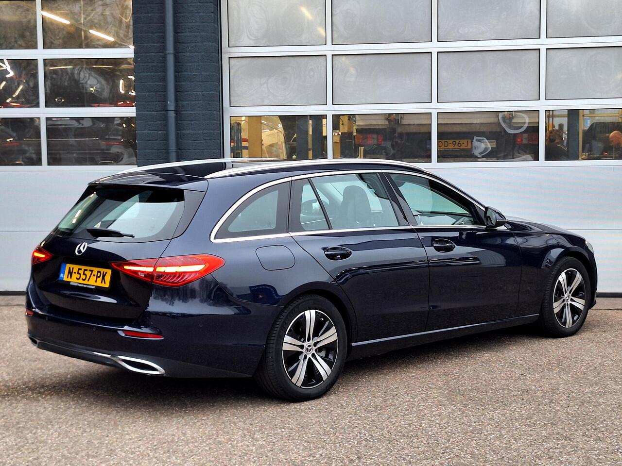 Mercedes-Benz C-KLASSE Estate 200 Launch Edition Luxury Line | Trekhaak | Rijassistentiepakket | Achteruitrijcamera | Sfeerverlichting | Stoelverwarming | Dodehoekassistentie | Elektrische achterklep