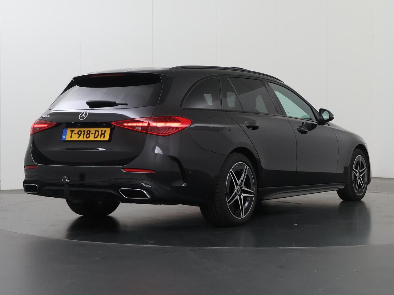 Mercedes-Benz C-KLASSE Estate 300 e AMG Night | Panoramadak | Trekhaak | Sfeerverlichting | Stoelverwarming | Alarm |