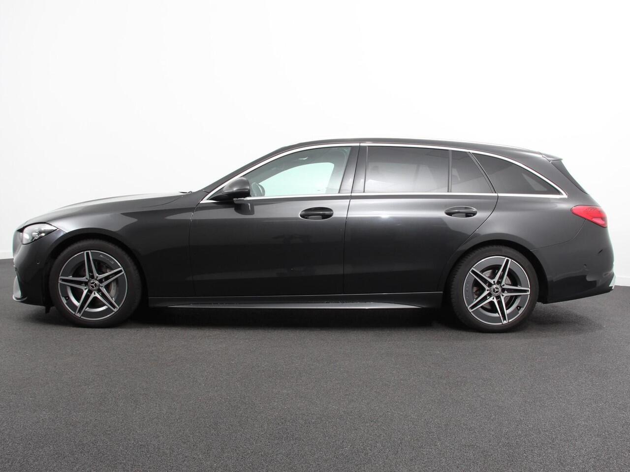 Mercedes-Benz C-KLASSE Estate 200 AMG Line | Climate control | Achteruitrijcamera | Wegklapbare trekhaak | Navigatie | Dodehoek assistent | LED | Sfeerverlichting | Adaptieve cruise control | Verwarmde voorstoelen | Elektrische kofferbak