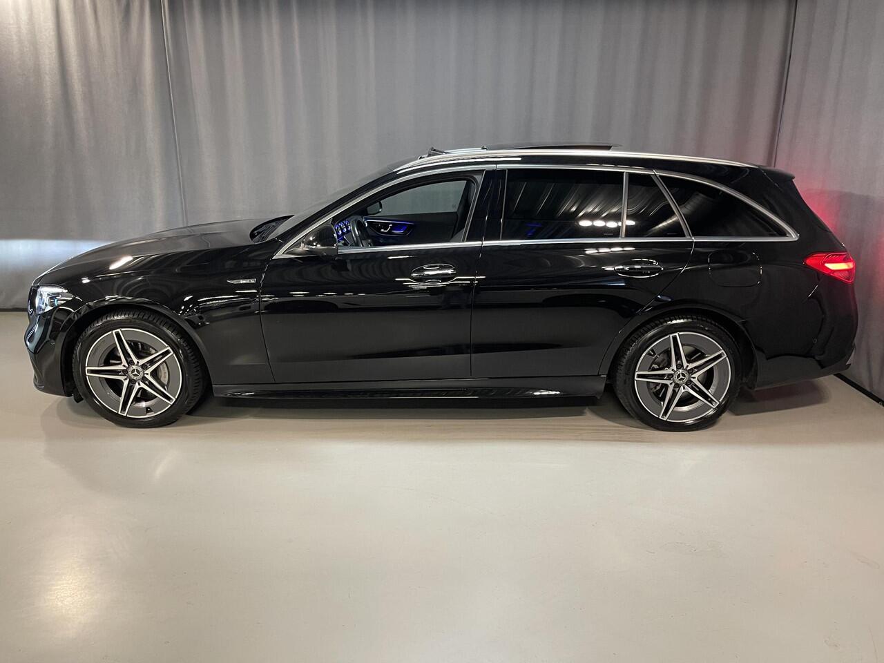 Mercedes-Benz C-KLASSE Estate 300 e AMG Line 18"/Panoramadak/Laser LED/Trekhaak/Stoelverwarming + memory l + r/Adaptieve cruise/Sfeerverlichting premium/Elektrische klep/Apple Carplay & Android Auto