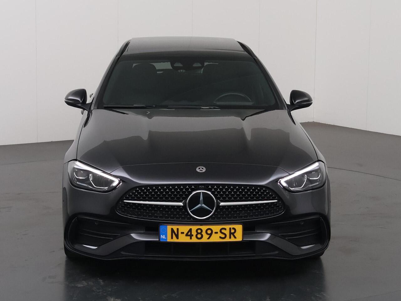 Mercedes-Benz C-KLASSE Estate 180 AMG Line | Night | Panoramadak | Multispaaks AMG velgen | Rijassistentiepakket Plus | Stoelverwarming |