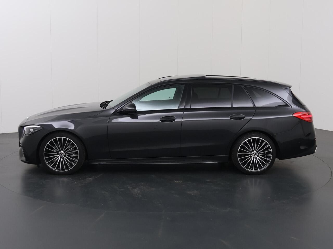 Mercedes-Benz C-KLASSE Estate 180 AMG Line | Night | Panoramadak | Multispaaks AMG velgen | Rijassistentiepakket Plus | Stoelverwarming |