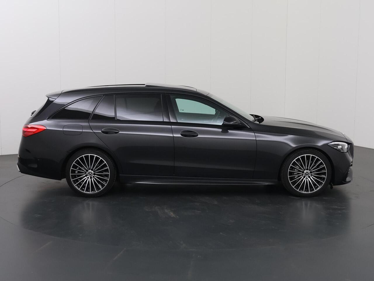 Mercedes-Benz C-KLASSE Estate 180 AMG Line | Night | Panoramadak | Multispaaks AMG velgen | Rijassistentiepakket Plus | Stoelverwarming |