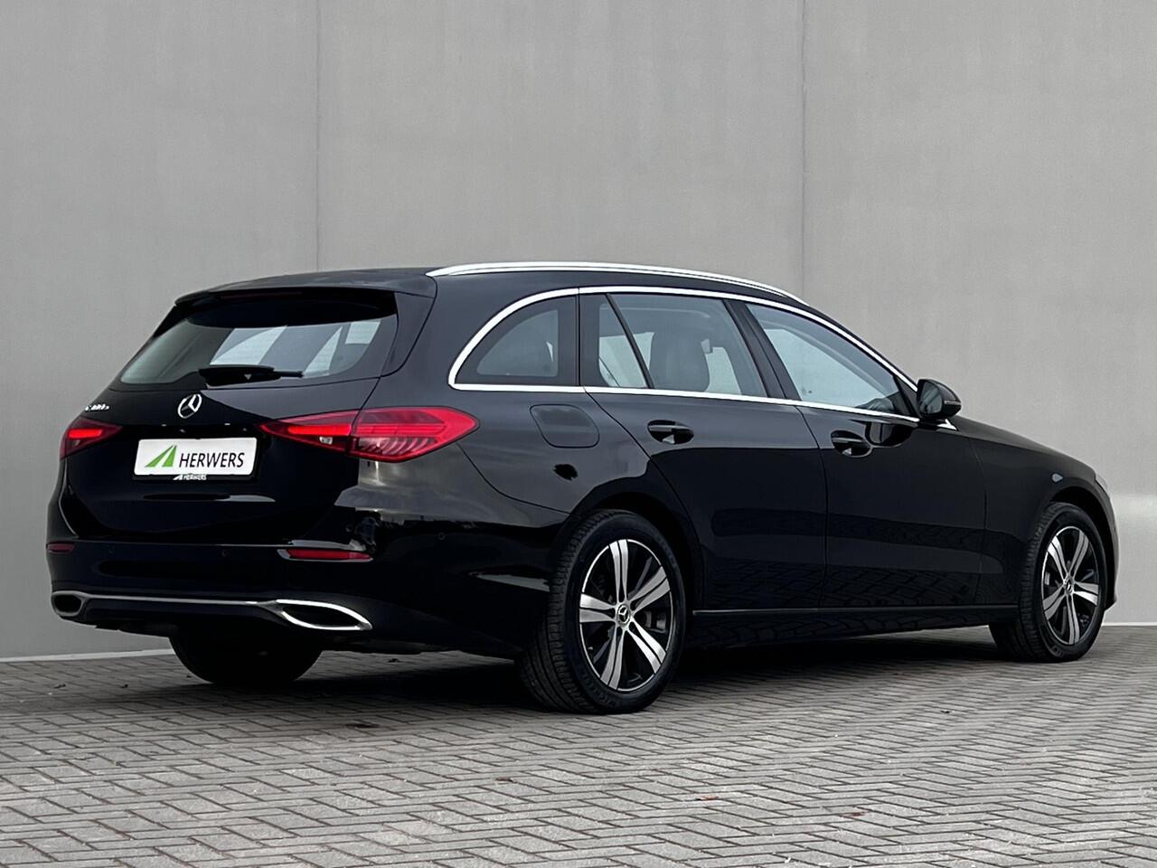 Mercedes-Benz C-KLASSE Estate 300 e Luxury Line Automaat 9 traps / Elektrische trekhaak 1.800 kg / EAER bereik 111 km / Avantgarde Interieur / Elektr. klep / Adapt. CC / Navigatie groot scherm / Winterwielenset /