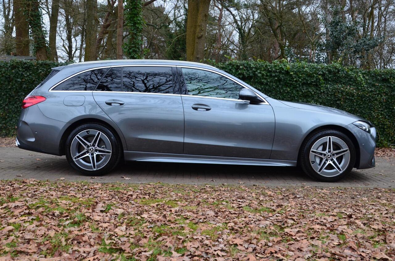 Mercedes-Benz C-KLASSE Estate 300 e AMG Line Automaat/Navi/Pdc/Ecc/Burmester 3D Surround Sound systeem/Rondomzicht camera/Stoelverwarming/Elektrisch verstelbare stoelen/Privacy-Glass/18-Inch Lmv