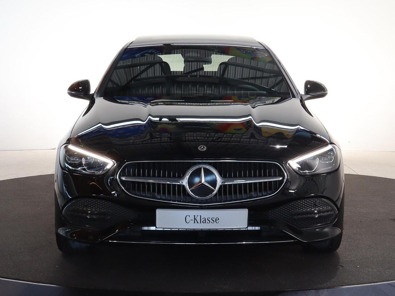 Mercedes-Benz C-KLASSE 180 Business Solution | Panoramaschuifdak | Trekhaak | Achteruitrijcamera | Verwarmde stoelen | Led-koplampen