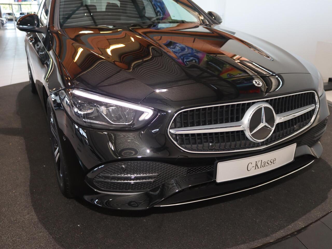 Mercedes-Benz C-KLASSE 180 Business Solution | Panoramaschuifdak | Trekhaak | Achteruitrijcamera | Verwarmde stoelen | Led-koplampen