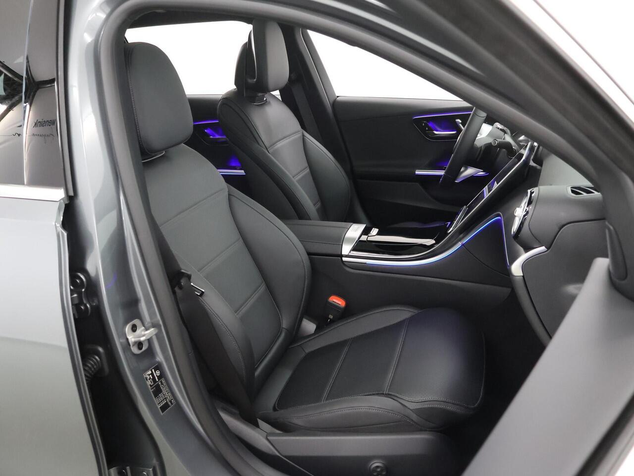 Mercedes-Benz C-KLASSE Estate 300e Star Edition | Achteruitrijcamera | Panoramaschuifdak | Sfeerverlichting | Stoelverwarming | Easypack-achterklep |