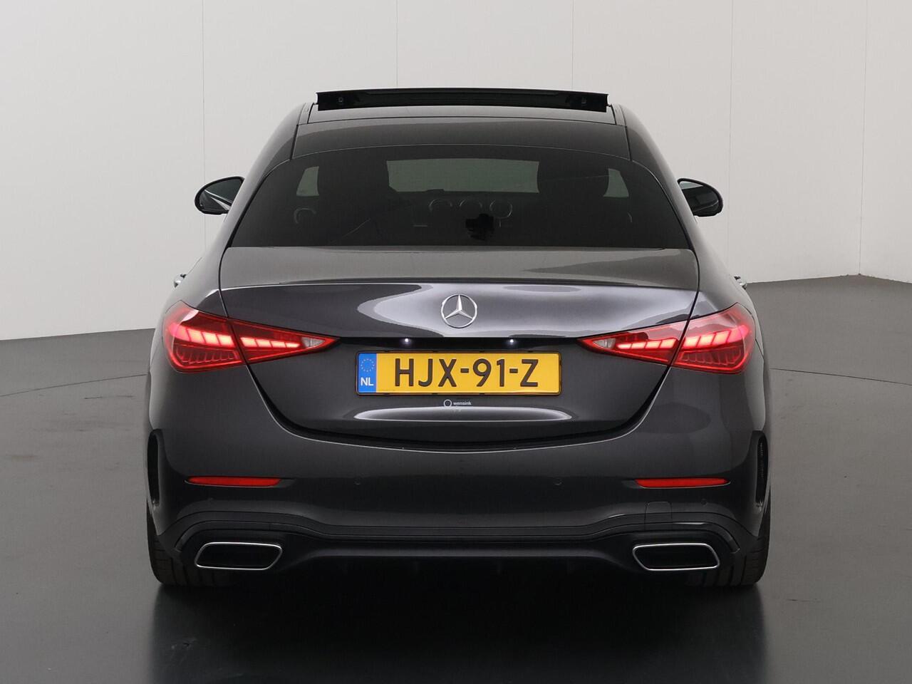 Mercedes-Benz C-KLASSE 180 Star Edition AMG Line | Night | Keyless | Panoramadak | Digitaal Licht | 360* Camera | Multispaaks AMG velgen |