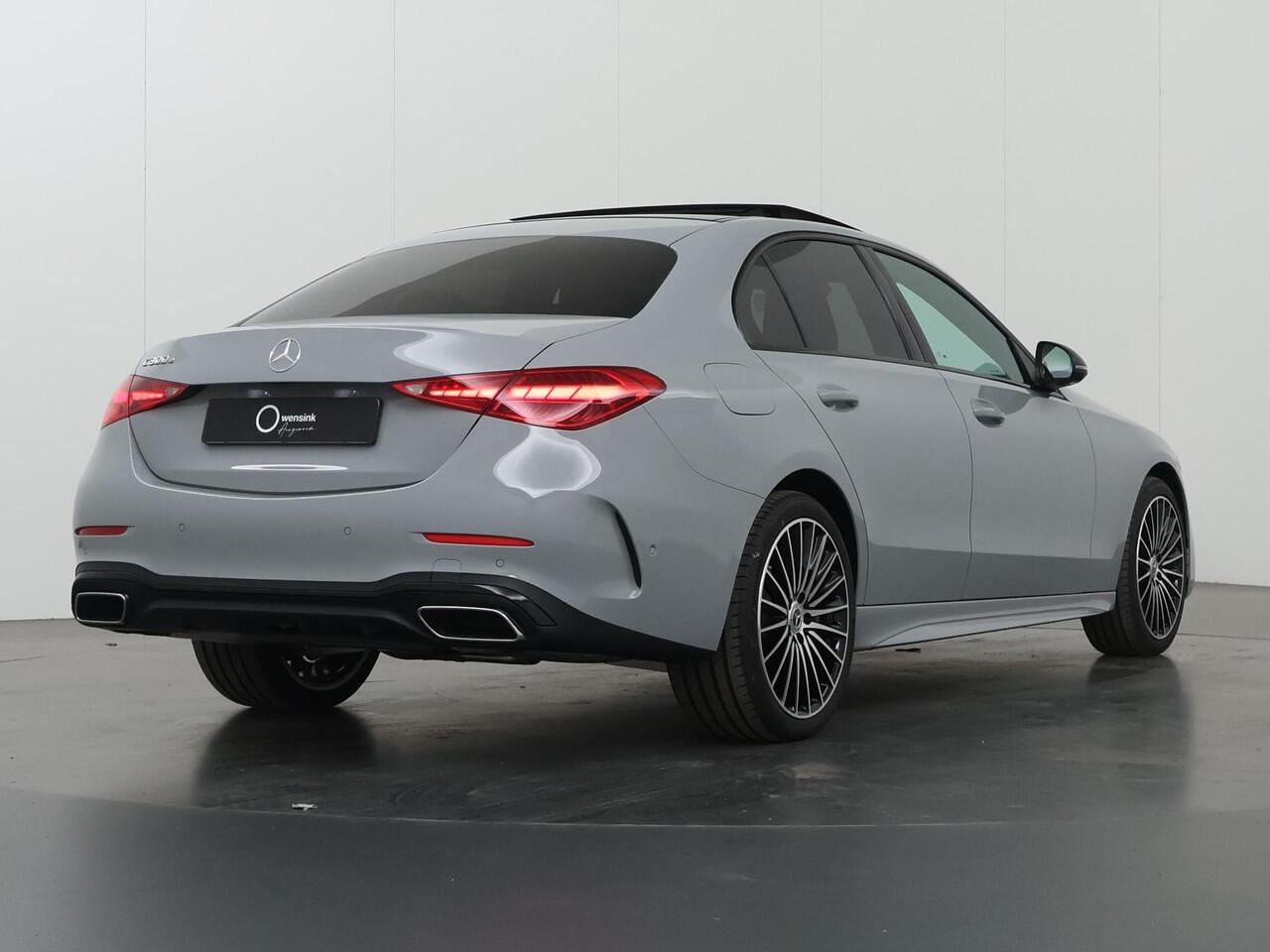 Mercedes-Benz C-KLASSE 300 e Business Solution AMG | Panoramaschuifdak | Trekhaak | DIGITAL LIGHT | Nightpakket | dodehoekassistent | 360° camera |