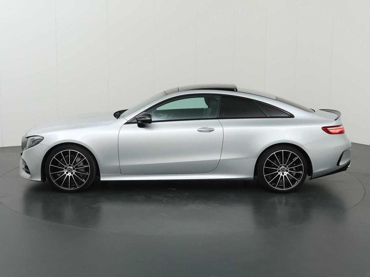 Mercedes-Benz E-KLASSE Coupé 200 Premium Plus | AMG | Night | Panoramadak | Memory | Burmester | Rijassistentiepakket | Lederen bekleding | 20" lichtmetalen velgen |