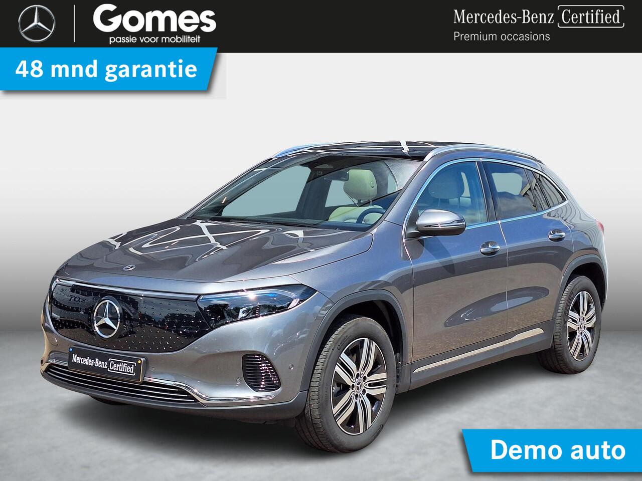 Mercedes-Benz EQA 250+ Luxury Line | Beige Interieur | Panoramadak | Trekhaak | Privacy Glas Achter | Sierdelen Lindehout Zwart | Dodehoekassistent | Apple CarPlay | Android Auto | Sfeerverlichting | Stoelverwarming | Elektrisch Inklapbare Buitenspiegels