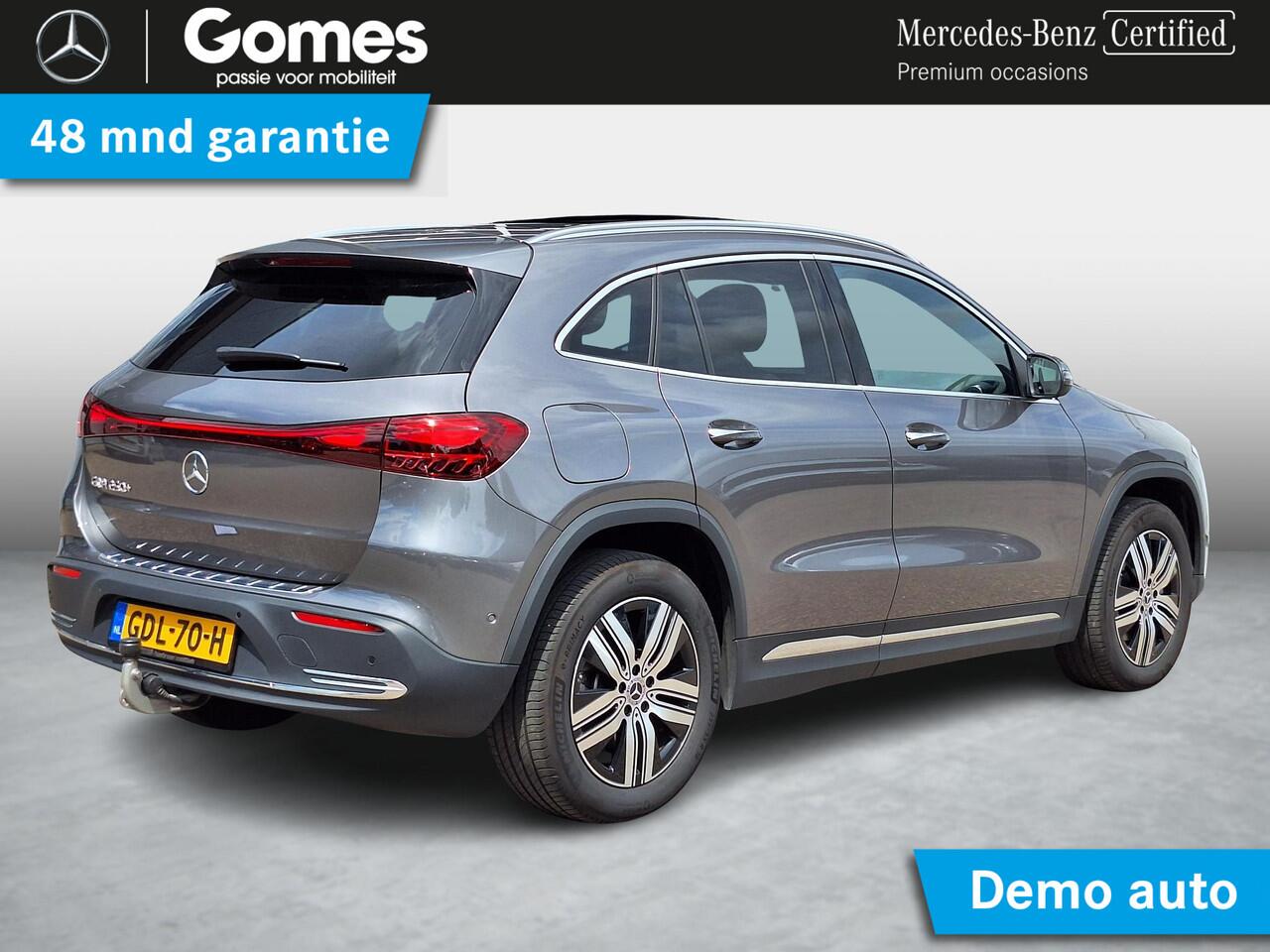 Mercedes-Benz EQA 250+ Luxury Line | Beige Interieur | Panoramadak | Trekhaak | Privacy Glas Achter | Sierdelen Lindehout Zwart | Dodehoekassistent | Apple CarPlay | Android Auto | Sfeerverlichting | Stoelverwarming | Elektrisch Inklapbare Buitenspiegels