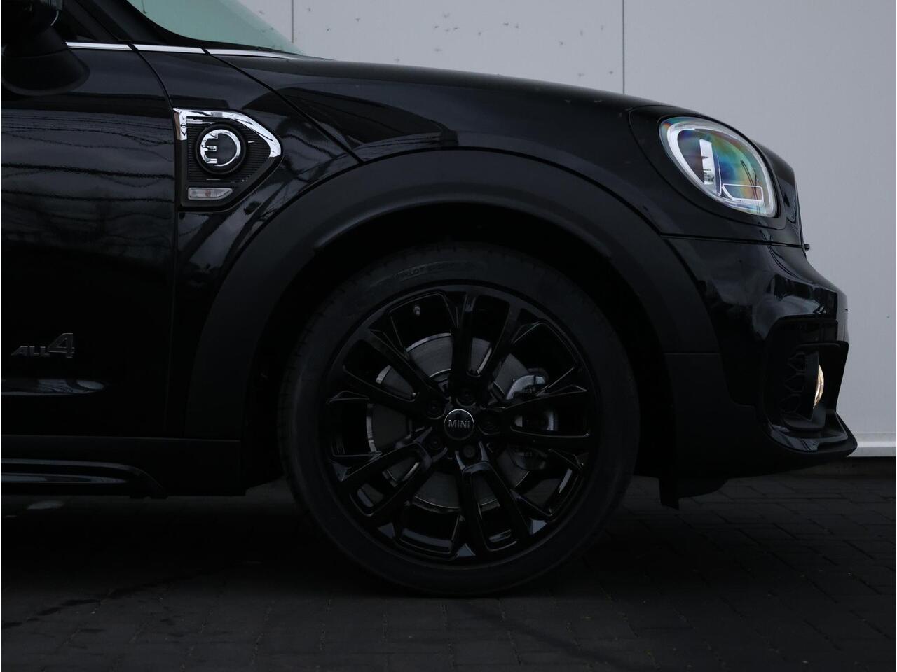 Mini COUNTRYMAN Mini Cooper S E ALL4 John Cooper Works | JCW-pakket | Glazen Panoramadak | Leder Chester Malt Brown | Stuur- en stoelverwarming | 19" JCW | Head-Up Display | Comfort Access | NEXT