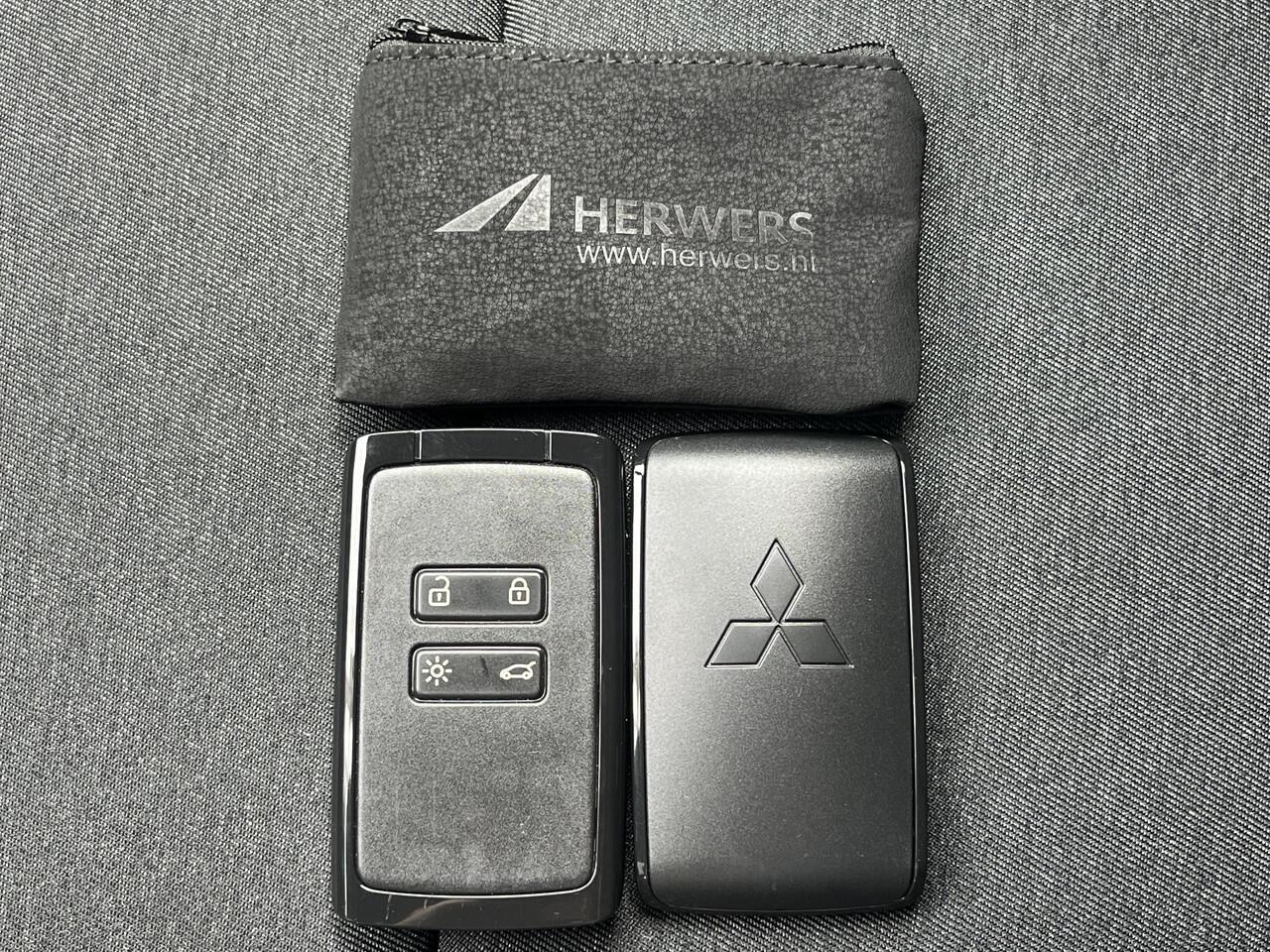 Mitsubishi ASX 1.8 HEV AT Intense Automaat / ¤2000,- Voordeel Op de Nieuwprijs / NIEUW uit voorraad leverbaar! / Achteruitrijcamera / Navigatie via Apple Carplay & Android Auto / Keyless Entry & Start / Verwarmde Voorstoelen / Cruise- en Climate Control / Parkeersensore