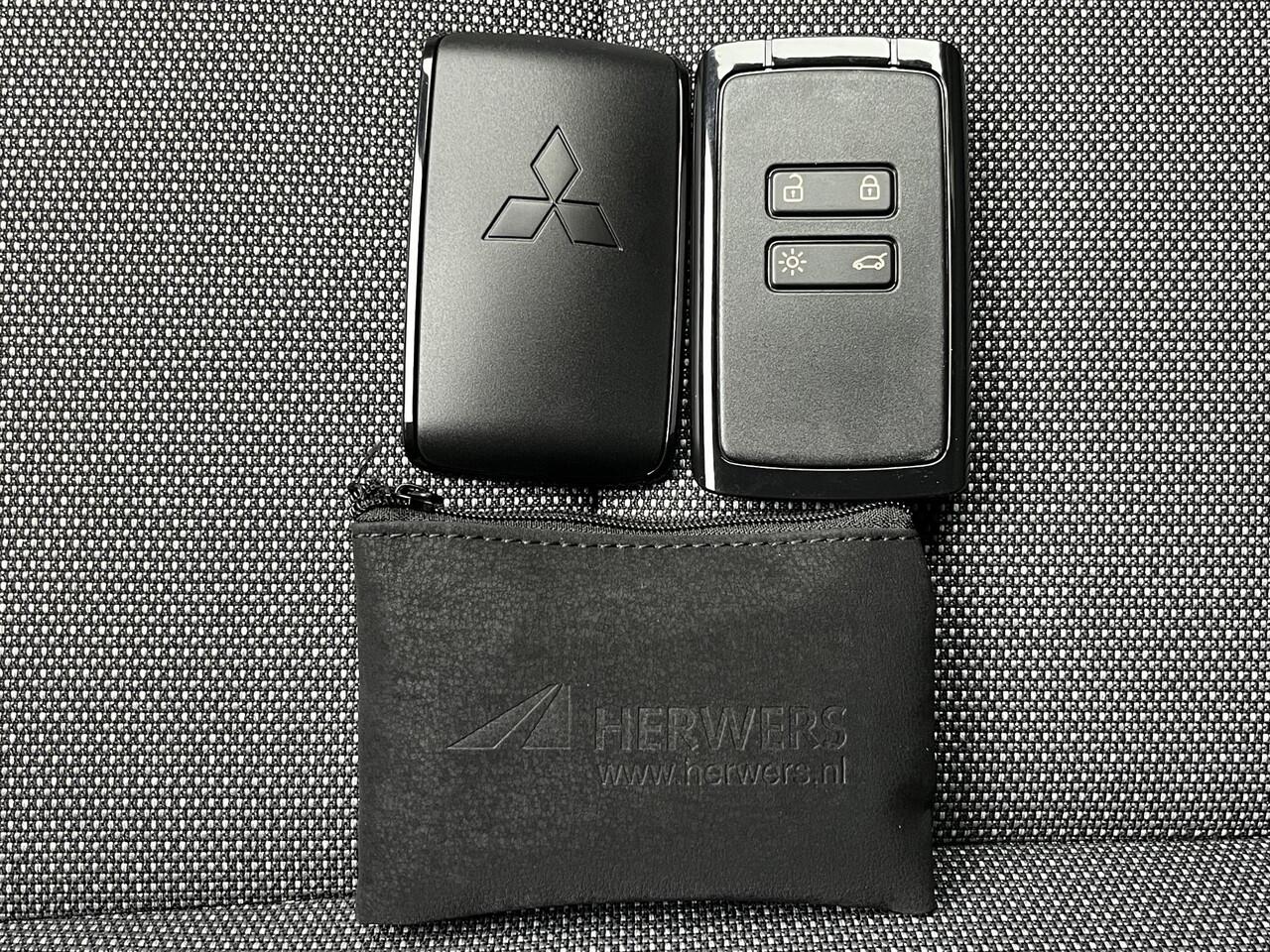 Mitsubishi ASX 1.8 HEV AT Intense+ / ¤ 3.000,- Voordeel op de Nieuwprijs / 8 Jaar Fabrieksgarantie / Achteruitrijcamera / Stuur- en Stoelverwarming / Voorruitverwarming / Keyless Entry & Start / Navigatie via Apple Carplay & Android Auto / Adaptieve Cruise Control / Cl