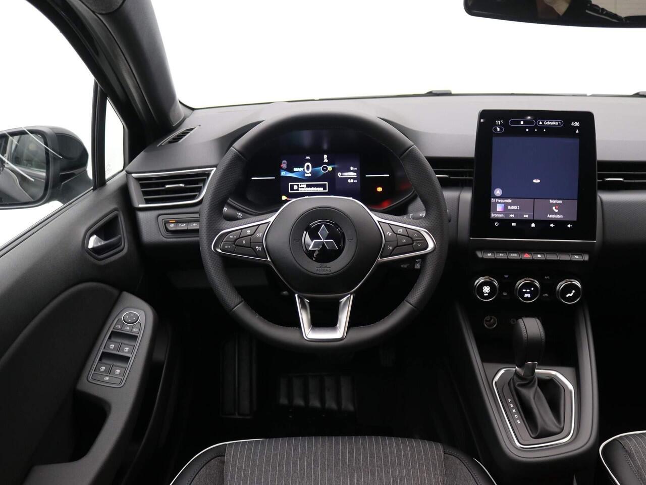 Mitsubishi COLT 1.6 HEV Intense+ / ¤4000,- Voordeel Op Nieuwprijs / Rijklaarprijs / Direct Leverbaar / 17" lichtmetalen velgen / Navigatie / Apple CarPlay/Android Auto / Achteruitrijcamera / Stoelverwarming /