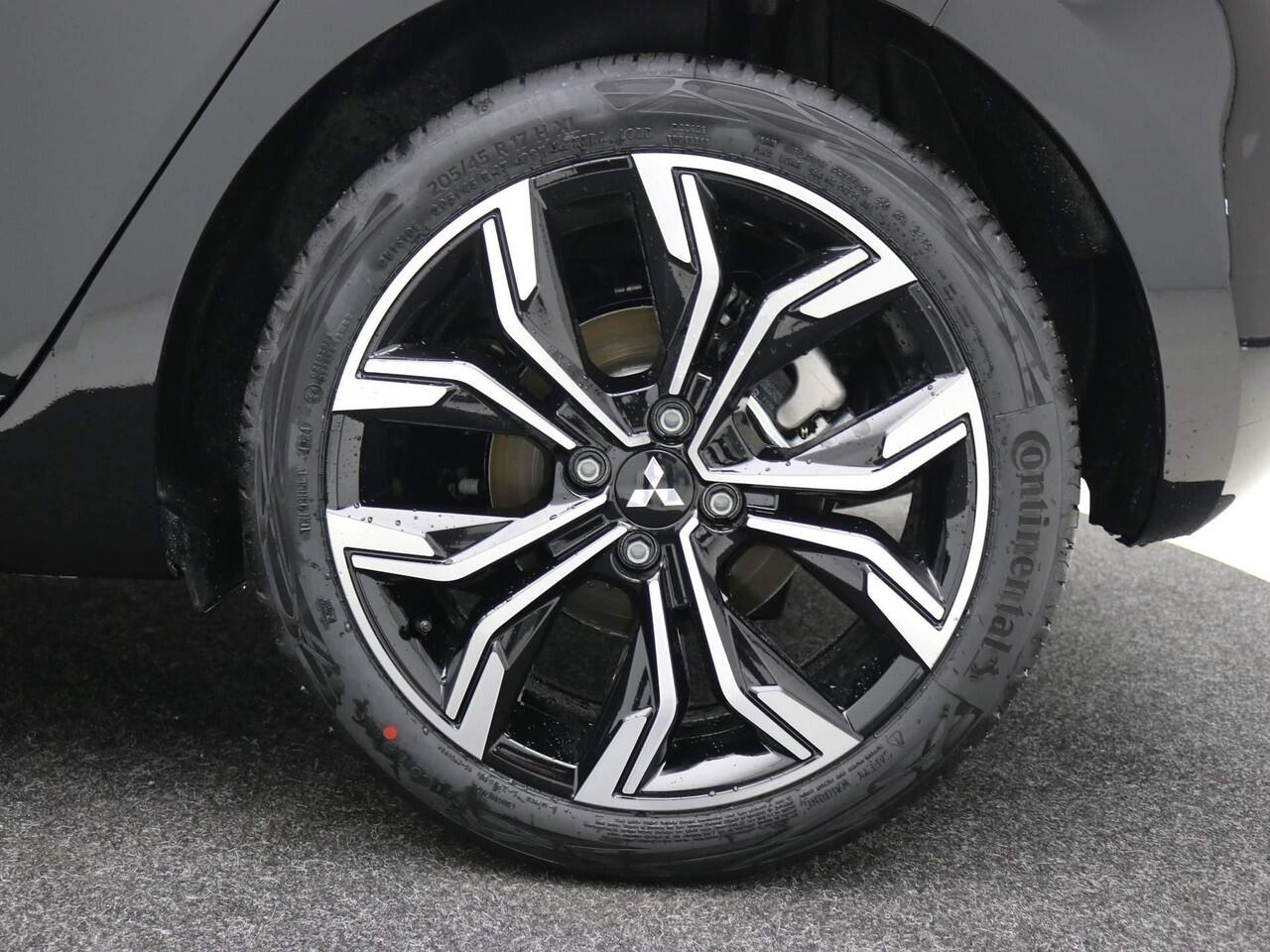 Mitsubishi COLT 1.6 HEV Intense+ / ¤4000,- Voordeel Op Nieuwprijs / Rijklaarprijs / Direct Leverbaar / 17" lichtmetalen velgen / Navigatie / Apple CarPlay/Android Auto / Achteruitrijcamera / Stoelverwarming /