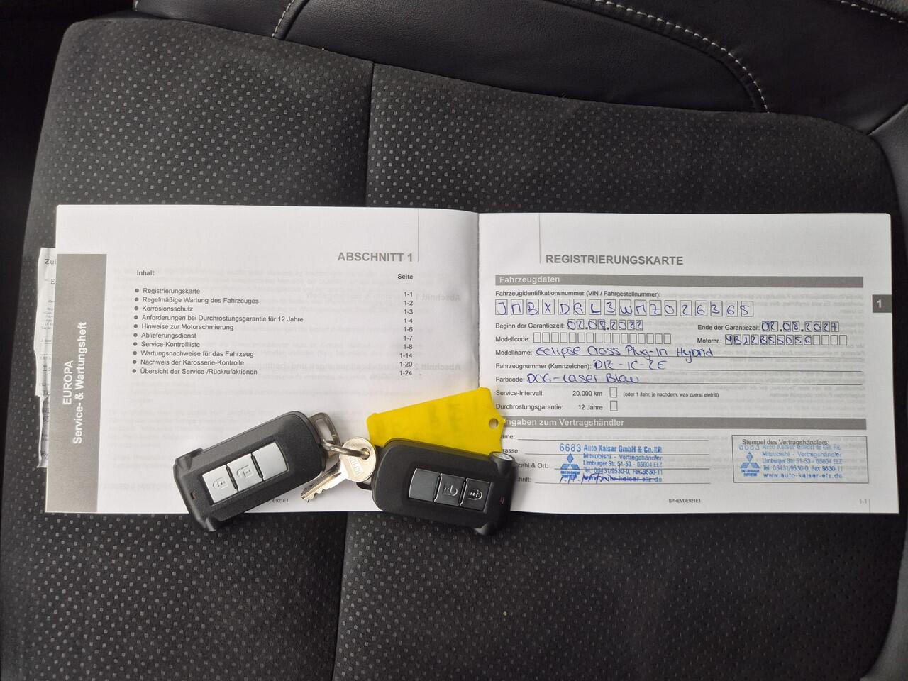 Mitsubishi ECLIPSE Cross 2.4 PHEV Plug-in Black Edition Automaat / Afneembare trekhaak / 1500kg Trekgewicht / Allseason banden / tot 8 jaar Garantie / Rondomzicht camera / Stuur-, Stoel en Achterbankverwarming / Adaptief CC /