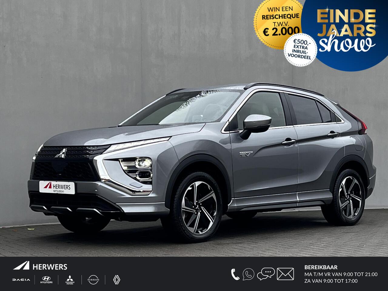 Mitsubishi ECLIPSE Cross 2.4 PLUG-IN HYBRID 4WD S-AWC Executive Automaat / Fabrieksgarantie tot 12-2030 / Trekhaak 1.500 kg / Leder / Elektrische stoelen / Navigatie / Stuur-, stoel - & achterbankverwarming / HUD / Camera 360° / 18" LM wielen + All Season banden /