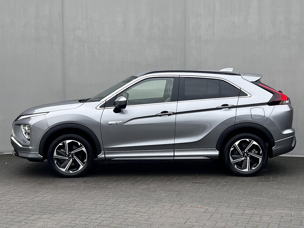 Mitsubishi ECLIPSE Cross 2.4 PLUG-IN HYBRID 4WD S-AWC Executive Automaat / Fabrieksgarantie tot 12-2030 / Trekhaak 1.500 kg / Leder / Elektrische stoelen / Navigatie / Stuur-, stoel - & achterbankverwarming / HUD / Camera 360° / 18" LM wielen + All Season banden /