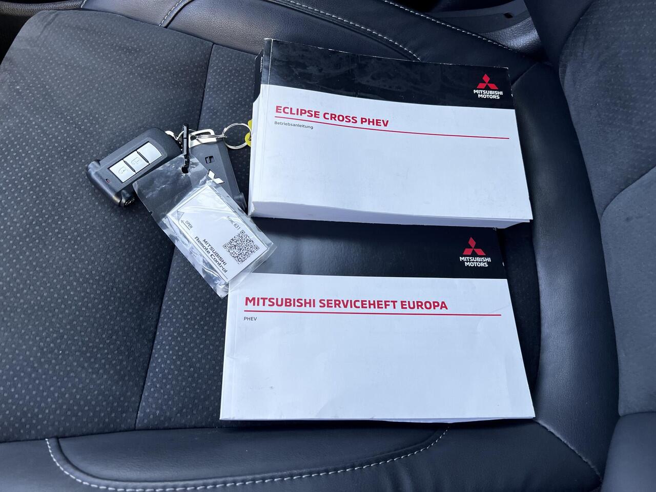 Mitsubishi ECLIPSE Cross 2.4 PHEV Intense+ / Fabrieksgarantie Tot 06-2027 / 1.500 kg trekgewicht / Elektrische bestuurdersstoel / Navigatie / Stoelverwarming / Apple Carplay/Android Auto / 18" LM wielen /