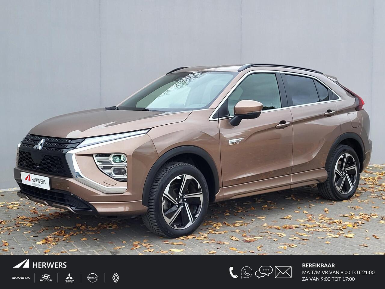 Mitsubishi ECLIPSE Cross 2.4 PHEV Business Executive / 5 jaar Fabrieksgarantie* / 1500 kg Trekgewicht / Navigatie / 360° camera / Achterbank-, stuur- en voorstoelverwarming / Adaptieve Cruise Control /Android Auto / Apple Carplay /