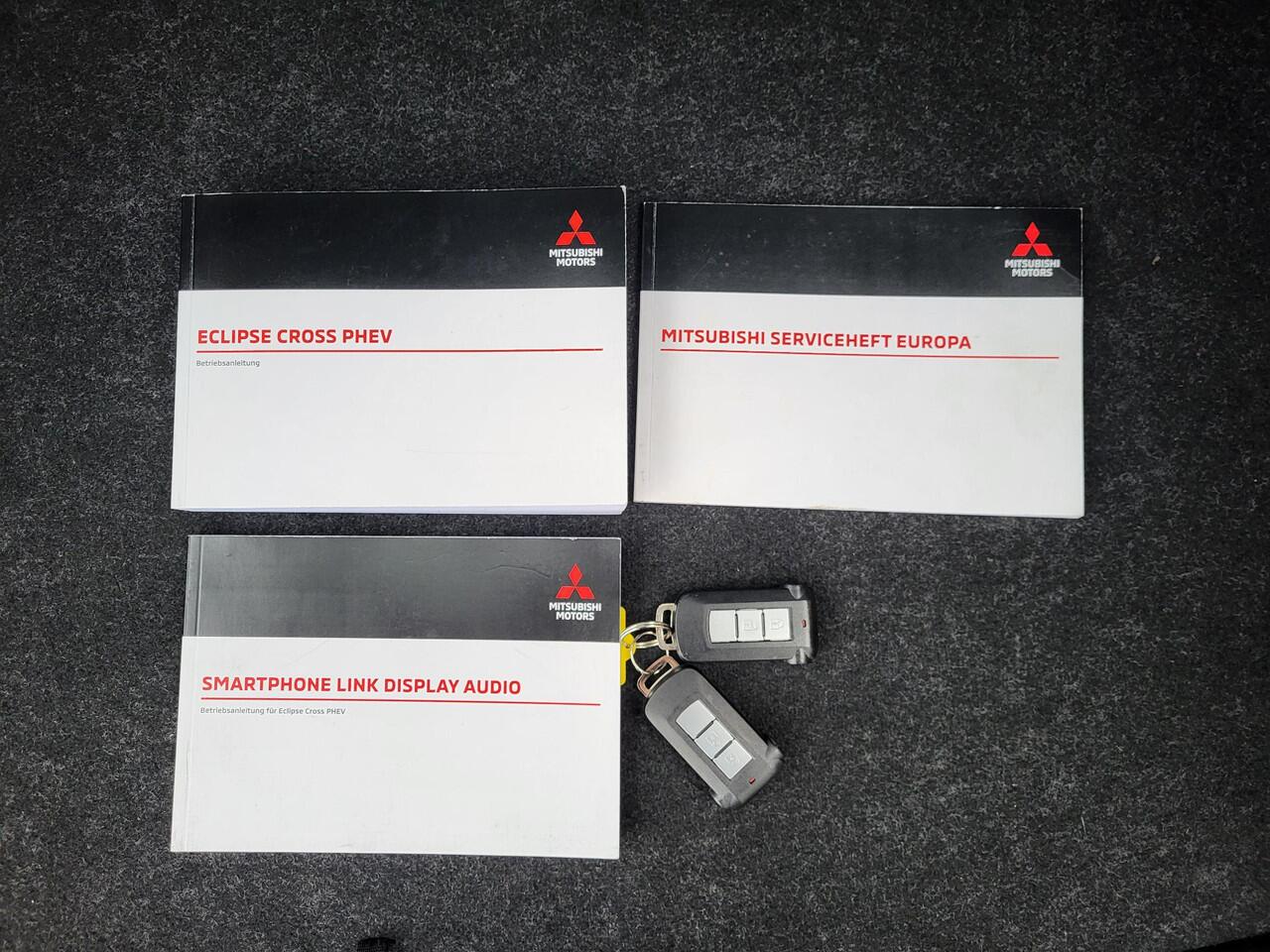 Mitsubishi ECLIPSE Cross 2.4 PHEV Business Executive / 5 jaar Fabrieksgarantie* / 1500 kg Trekgewicht / Navigatie / 360° camera / Achterbank-, stuur- en voorstoelverwarming / Adaptieve Cruise Control /Android Auto / Apple Carplay /