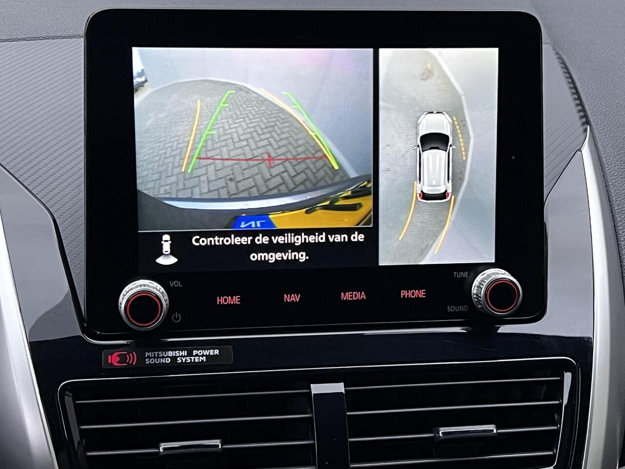 Mitsubishi ECLIPSE Cross 2.4 PHEV Business Executive 4WD Automaat / Fabrieksgarantie tot 11-2031 mogelijk ** / Goed onderhouden / Camera 360° / Stuur-, stoel- en achterbankverwarming / Adaptieve Cruise Control / Apple Carplay Android / 18" LM wielen met All Season banden /