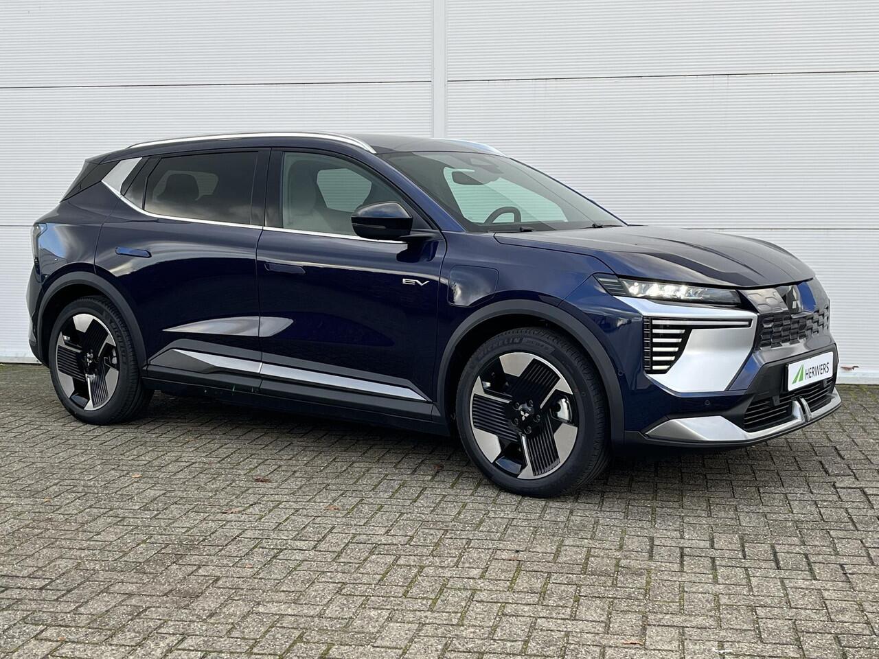 Mitsubishi ECLIPSE Cross Intense 87 kWh / ¤4.000 introductiekorting / Nieuw Model! / 100% Elektrisch / 621 KM WLTP / 1.100 KG Trekgewicht / Achteruitrijcamera / Google Maps Navigatie / Stuur- & Stoelverwarming /