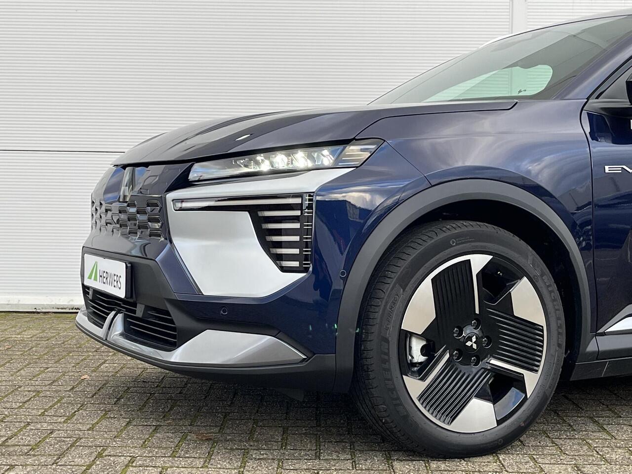 Mitsubishi ECLIPSE Cross Intense 87 kWh / ¤4.000 introductiekorting / Nieuw Model! / 100% Elektrisch / 621 KM WLTP / 1.100 KG Trekgewicht / Achteruitrijcamera / Google Maps Navigatie / Stuur- & Stoelverwarming /