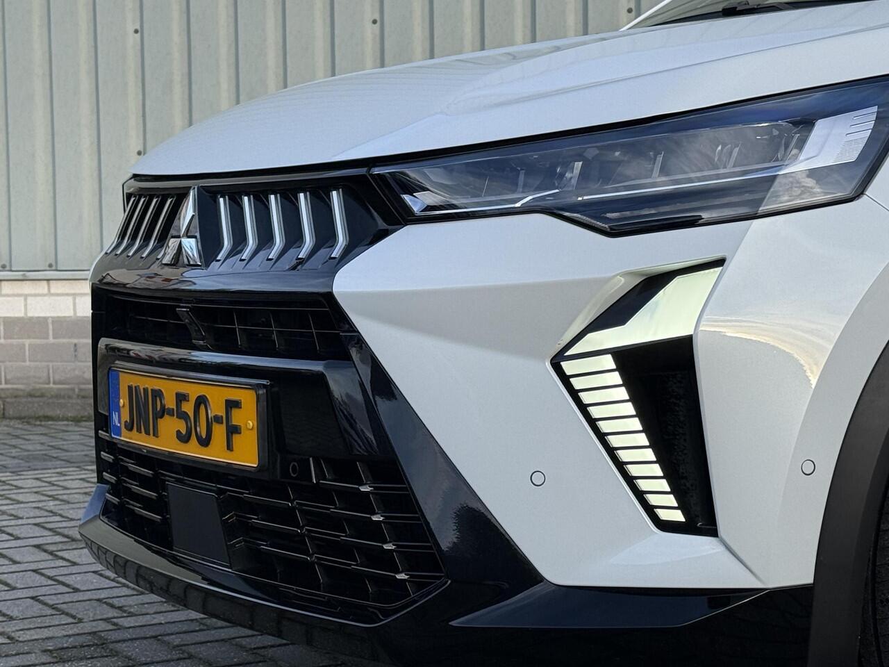 Mitsubishi GRANDIS 1.8 HEV Instyle / Lederen Bekleding / Stoel- en Stuurverwarming / Google Maps Navigatie / Harman/Kardon Audio / 360 Graden Camera / Panoramadak / Elektrisch Verstelbare Stoel / Elektrische Kofferbak / Adaptive Cruise Control /