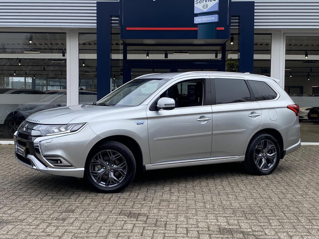 Mitsubishi OUTLANDER 2.4 PHEV Intense / Automaat / NL-Auto / Dealer-Onderhouden / 1e-Eigenaar / AWD / Afneembare-Trekhaak / Standkachel / Cruise-Control / Climate-Control / Stoelverwarming / Elektr.-Stoelen / Apple-Carplay & Android-Auto / Dodehoek-Detectie / LED / Keyless / 